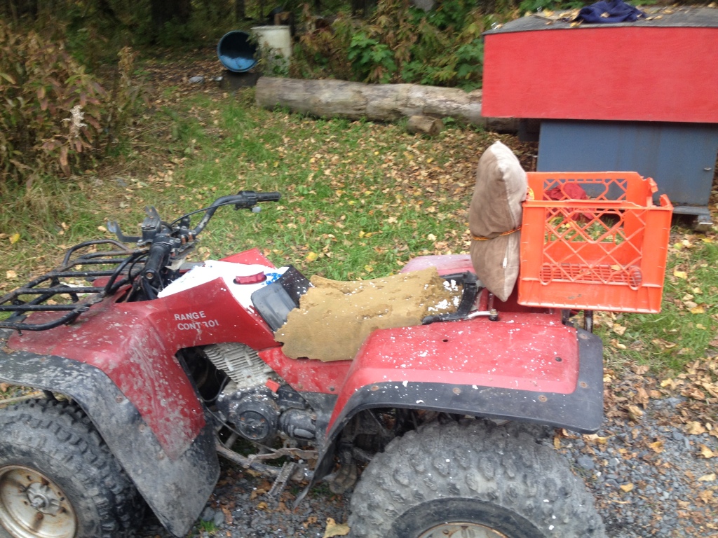 Travis has enjoyed his "new" back rest on his dog sled runs!