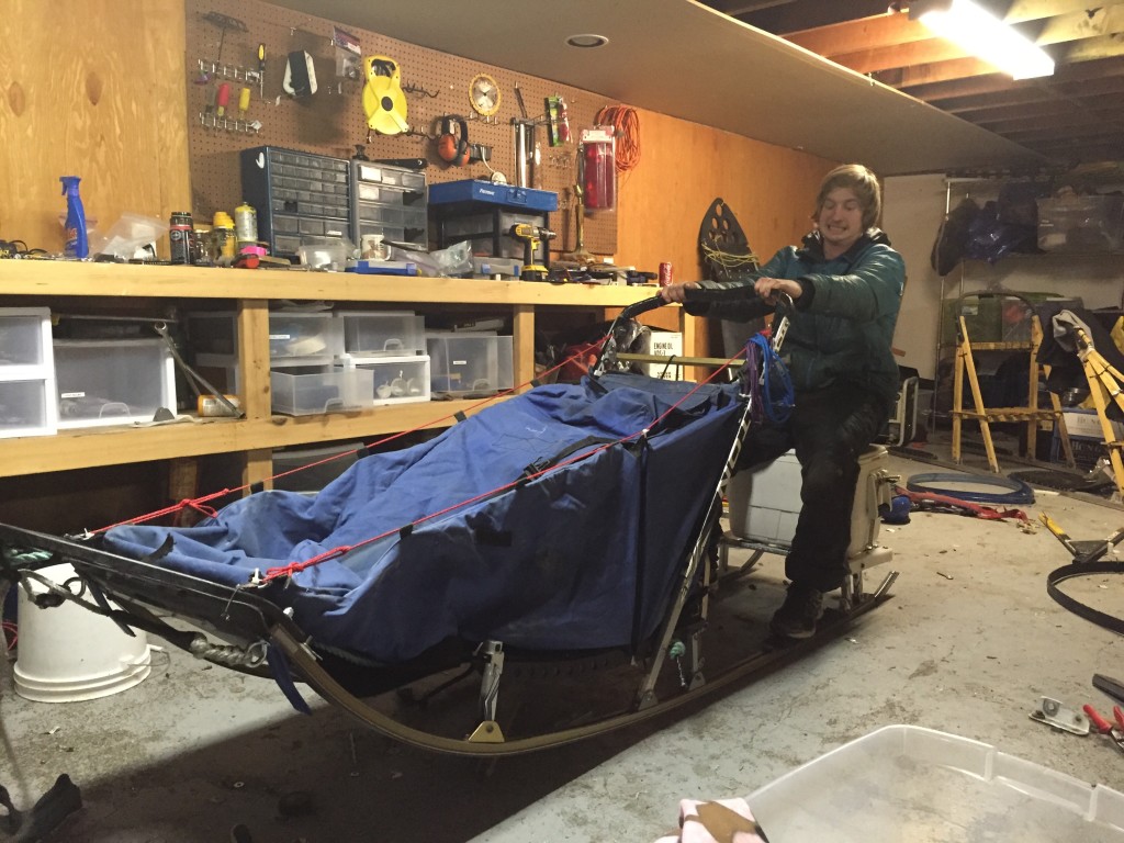 My First Dog Sled 5 Travis Beals sitting on the seat he built for his first homemade dog sled
