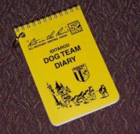 The Iditarod Vet Book is a yellow notebook used by Iditarod mushers