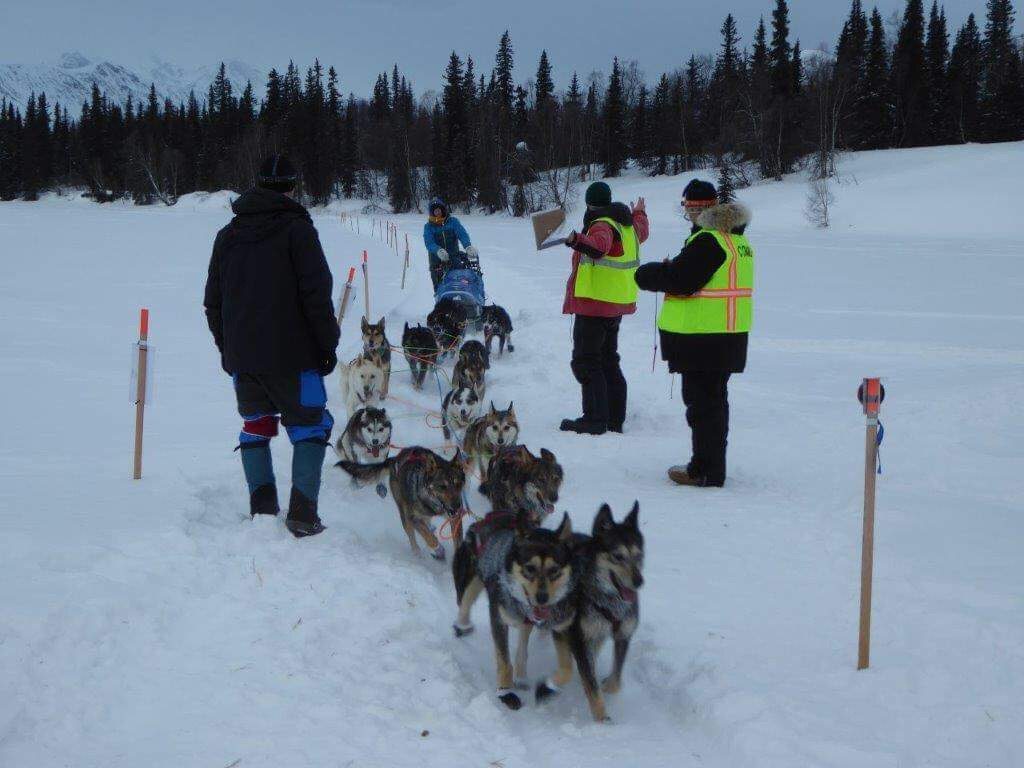 Travis Beals leaves the Finger Lake Checkpoint in the 2018 Iditarod.